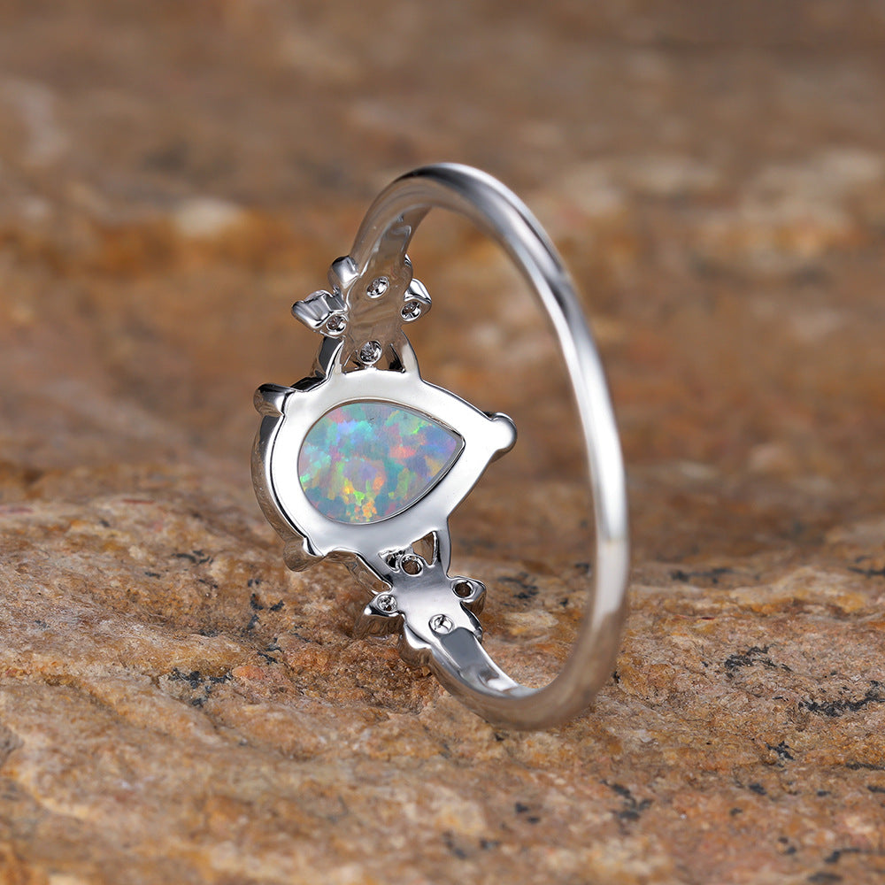 Damen Ring mit eleganter Opalstein-Fassung und zarten Zirkonia Shop Nory