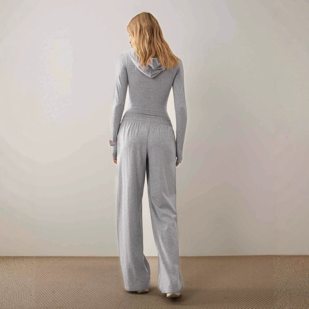 Damen Zweiteiliges Loungewear-Set geripptes Crop-Kapuzenoberteil mit Reißverschluss und Daumenloch sowie weiter Jogginghose Shop Nory