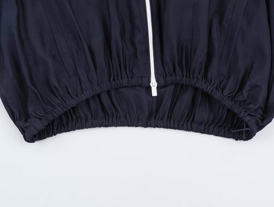 Damen Cropped Windbreaker-Jacke mit hohem Funnelkragen, Kontrastpaspel und elastischem Saum Shop Nory
