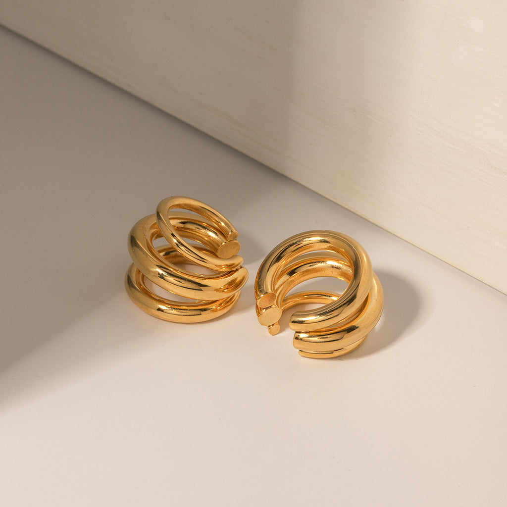 Damen Offene Creolen mit geschwungenem Design und elegantem Glanz Shop Nory