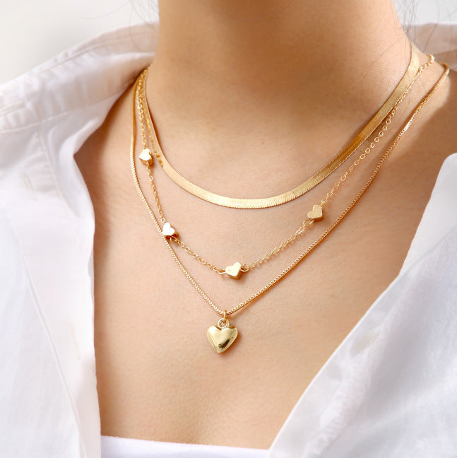 Damen Halsketten-Set mit zarten Herzanhängern und eleganten Gliederketten Shop Nory