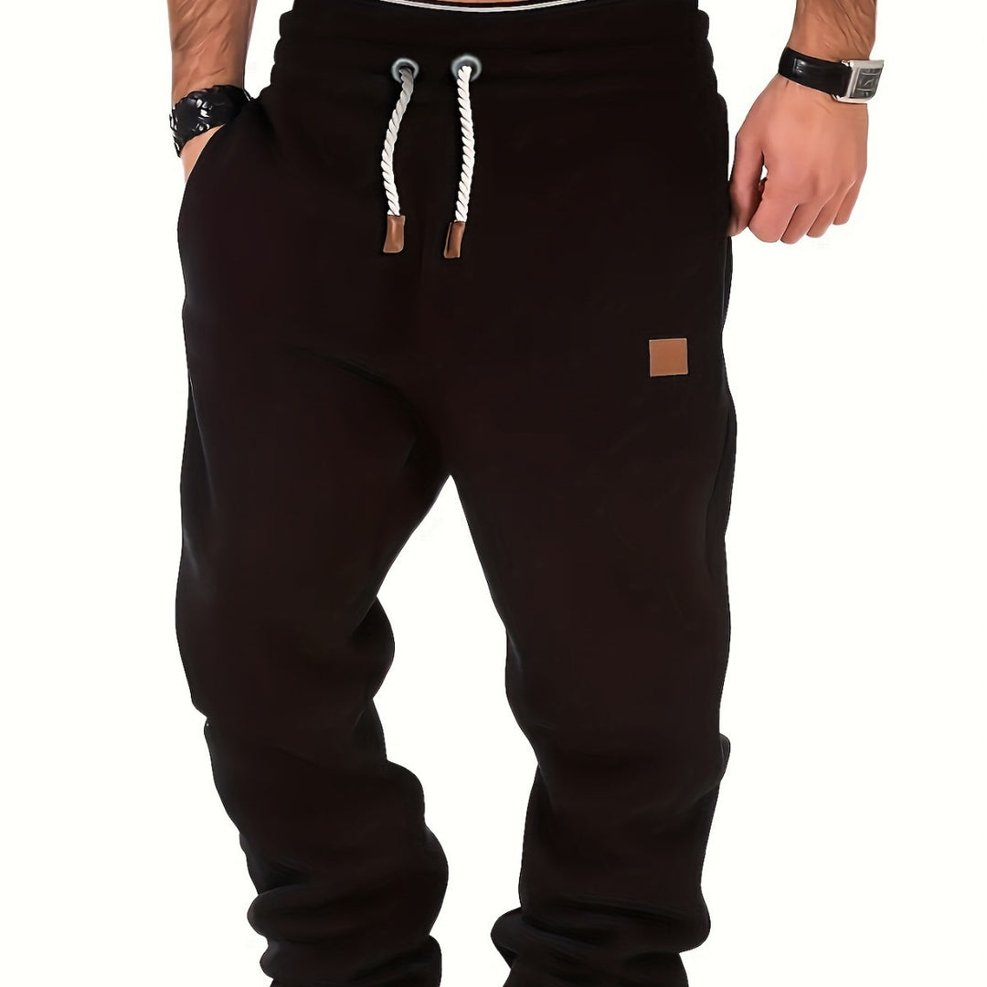 Herren melierter Relax-Jogger mit breitem Komfortbund, gedrehtem Kordelzug und gerippten Knöchelabschlüssen Shop Nory