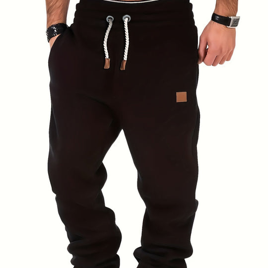 Herren melierter Relax-Jogger mit breitem Komfortbund, gedrehtem Kordelzug und gerippten Knöchelabschlüssen Shop Nory
