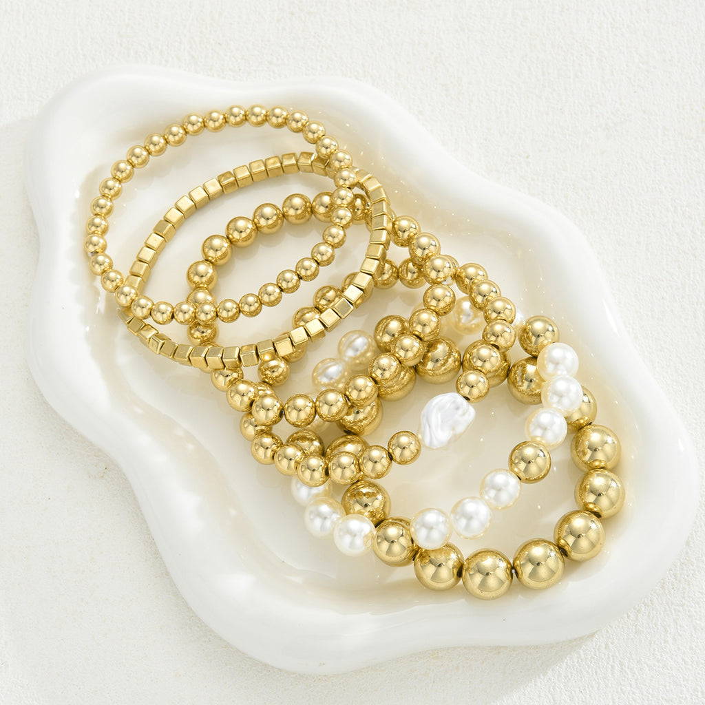 Damen Armreif-Set mit eleganten, glänzenden Kugeln und Perlen Shop Nory