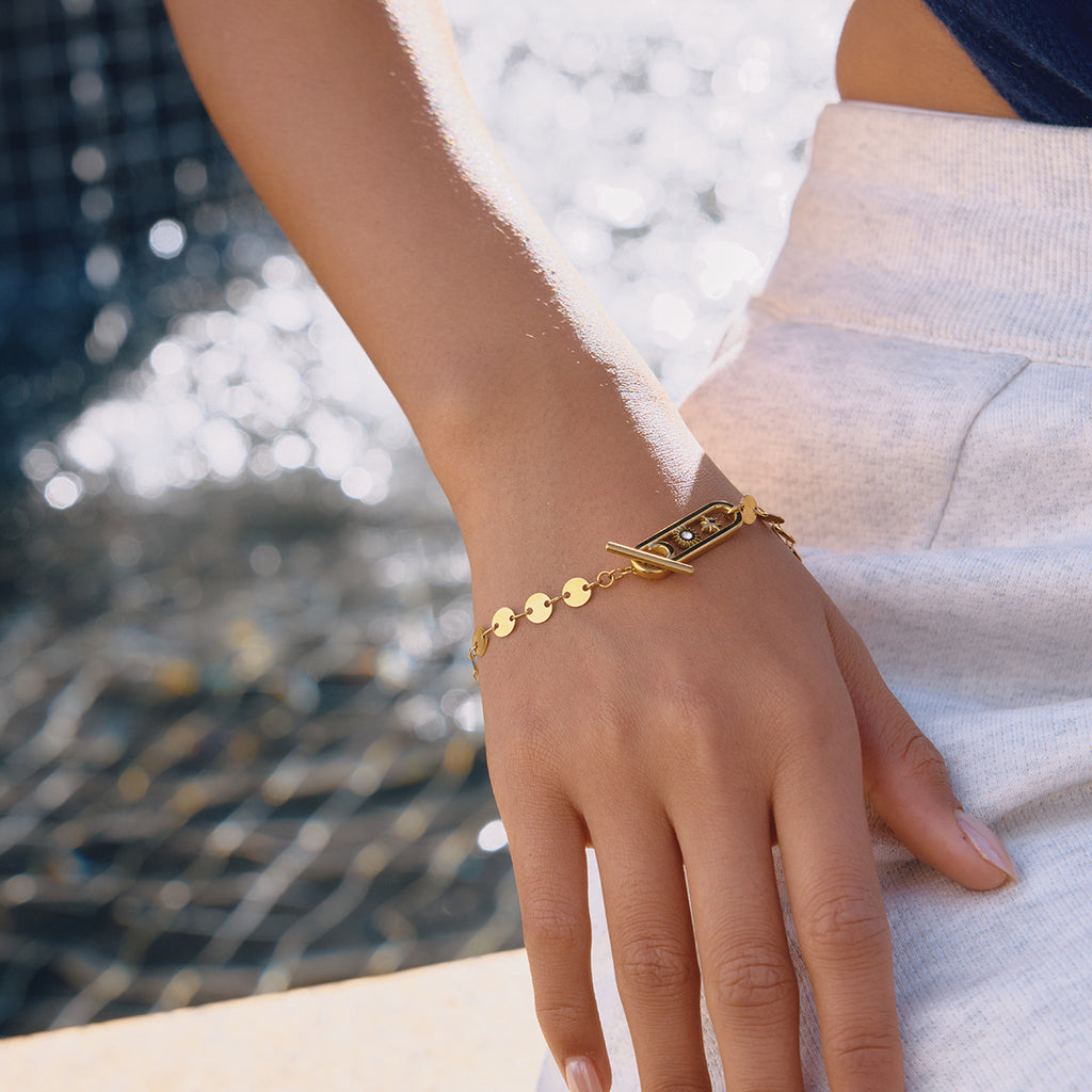Damen Armband mit eleganten runden Anhängern aus hypoallergenem Edelstahl Shop Nory