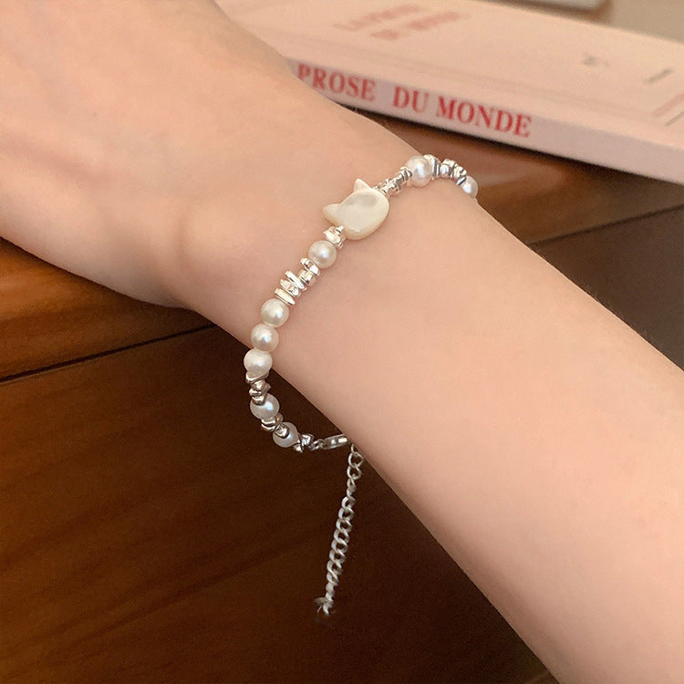 Damen Armband mit handgefertigtem Katzenanhänger und edlen Perlen Shop Nory