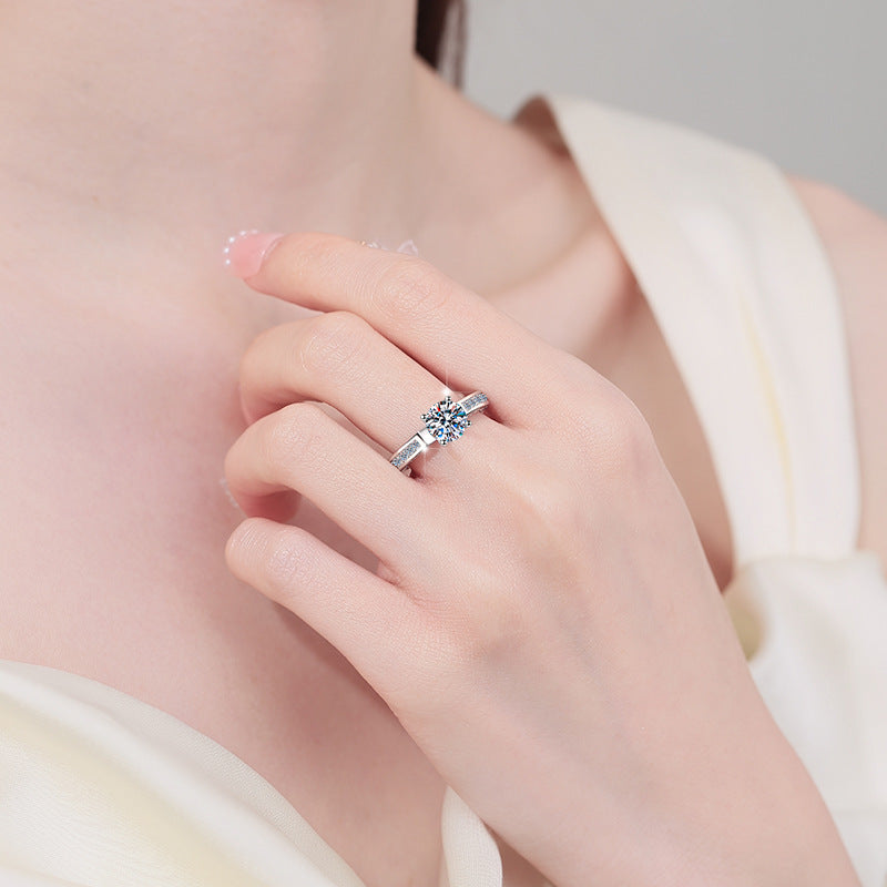 Damen Glänzender Zirkonia-Solitär Ring mit eleganter Pavé-Verzierung Shop Nory