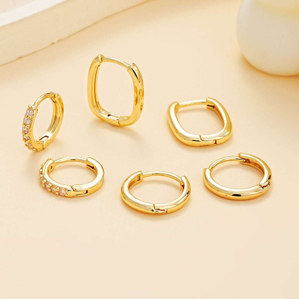 Damen Ohrstecker-Set mit stilvollem geschwungenen Design und funkelnden Akzenten Shop Nory