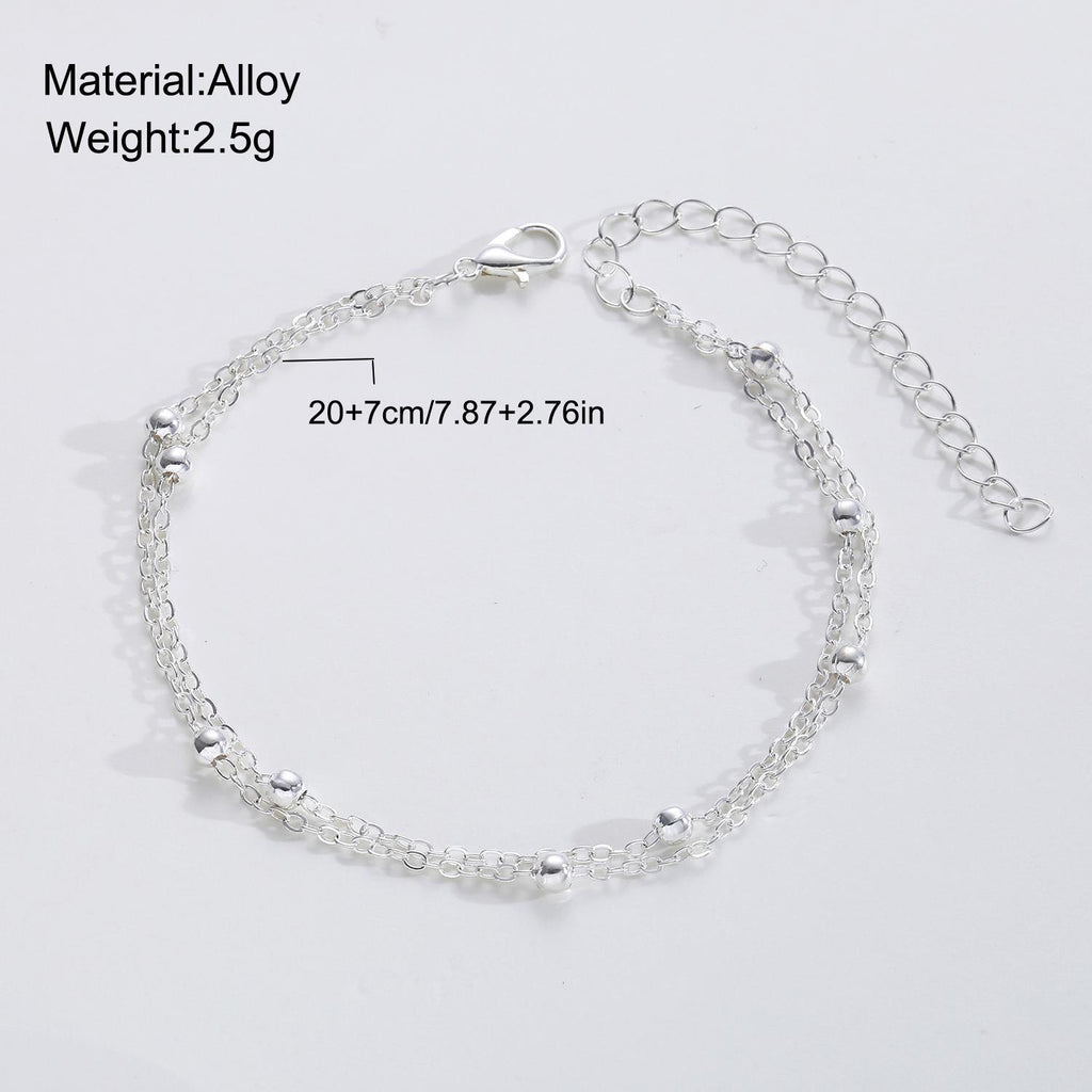 Damenarmband mit modischem Doppelketten-Design und eleganten Metallakzenten Shop Nory
