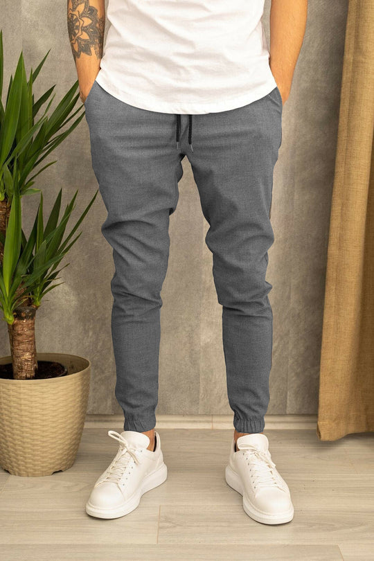 Herren nan schmal geschnittene Jogginghose mit elastischem Bund, Kordelzug und geripptem Knöchelbund Shop Nory