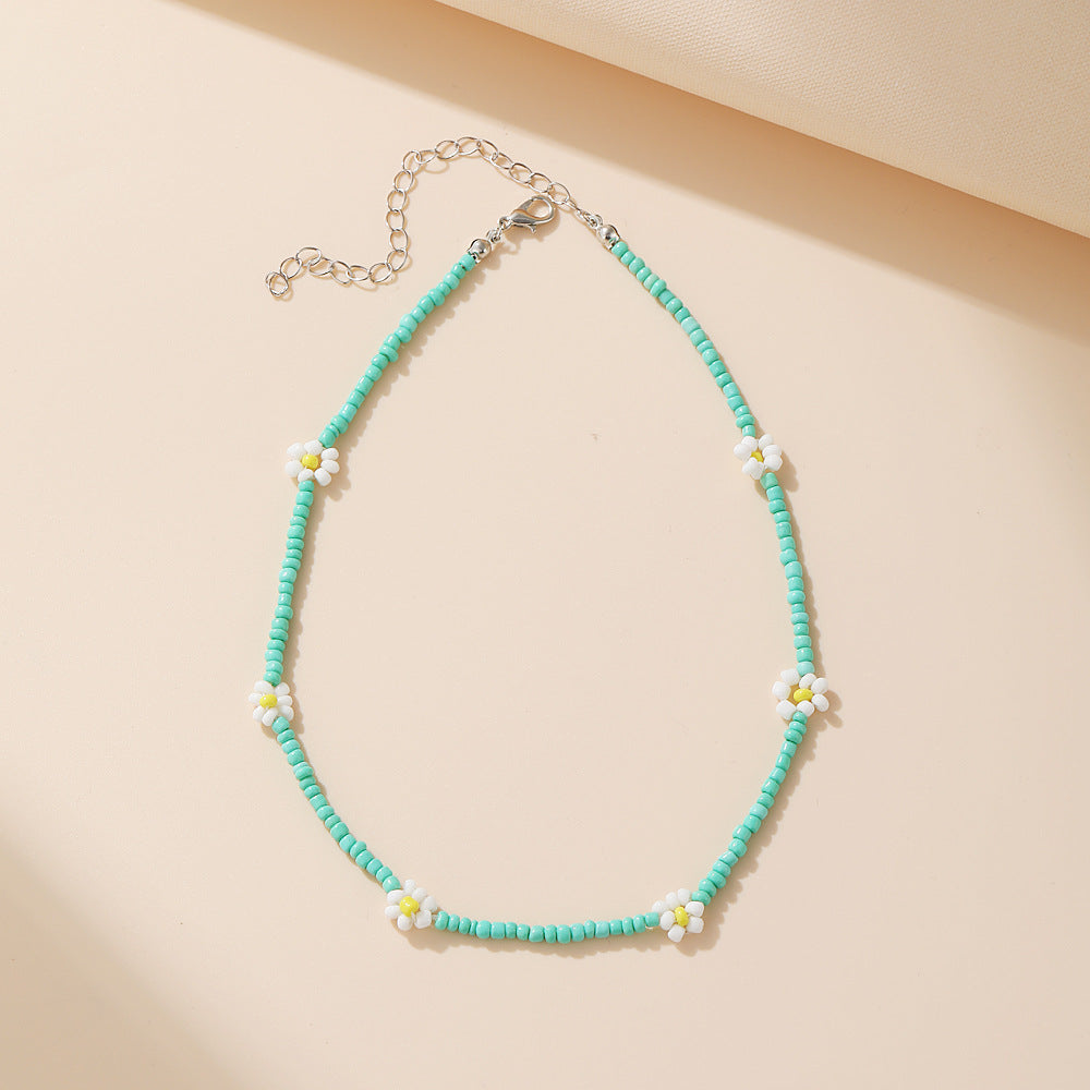Damen feine Halskette mit goldfarbenen Akzenten und eleganten Glasperlen Shop Nory