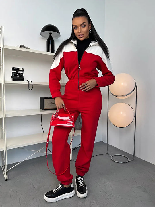 Damen gemütlicher Fleece-Overall mit Kapuze, durchgehendem Reißverschluss und elastischen Bündchen Shop Nory