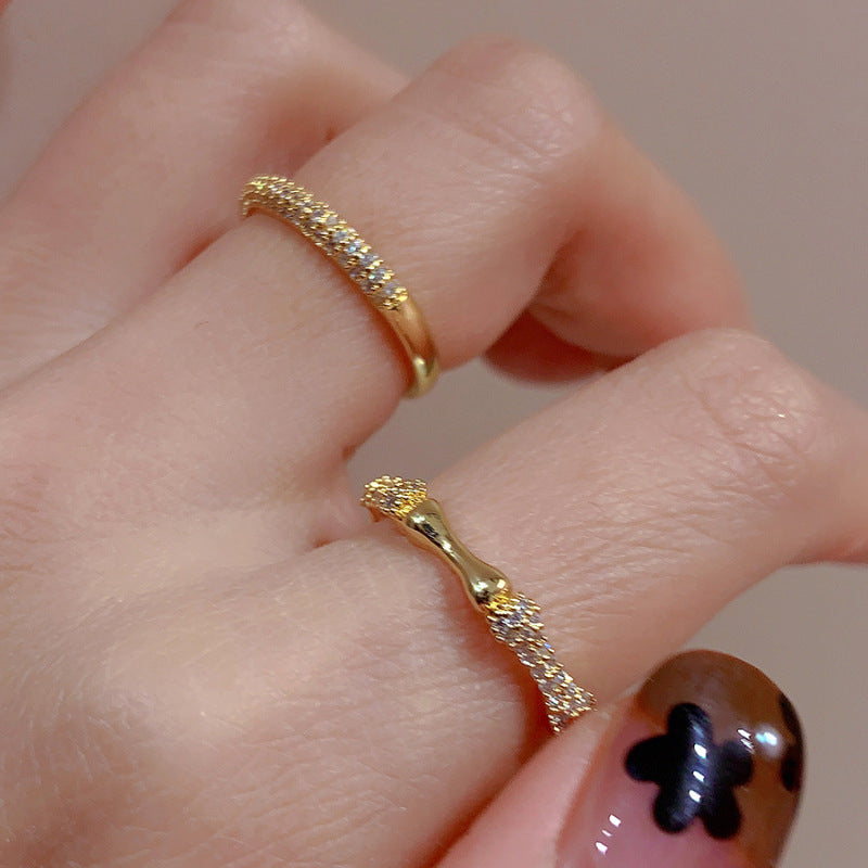Damen zierlicher Goldring mit kunstvollem Flechtmuster Shop Nory