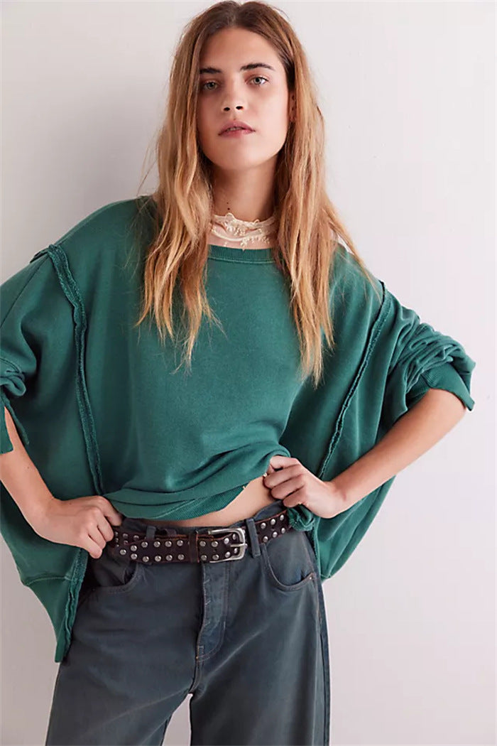 Damen oversized Sweatshirt mit Ballonärmeln, offenen Saumnähten und seitlichen Schlitzen Shop Nory