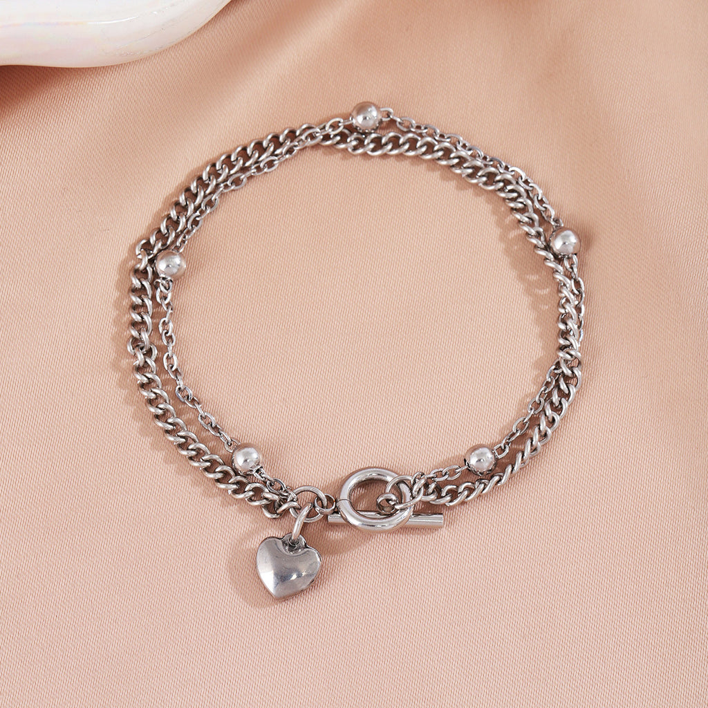 Damenarmband mit Herzanhänger aus hochwertigem Metall Shop Nory