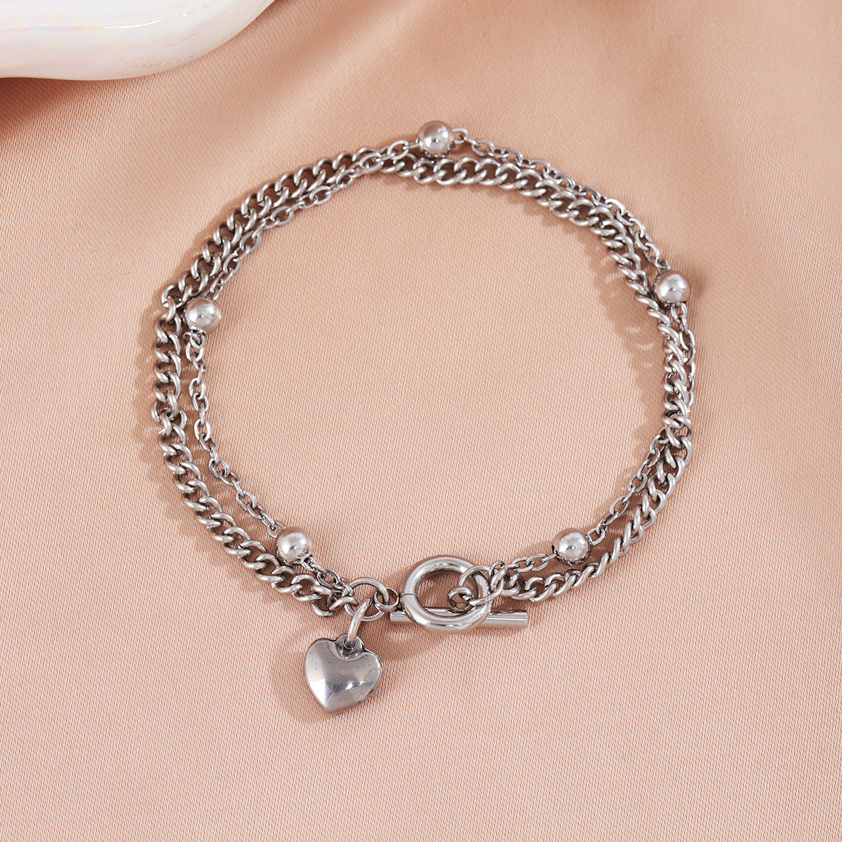 Damenarmband mit Herzanhänger aus hochwertigem Metall Shop Nory