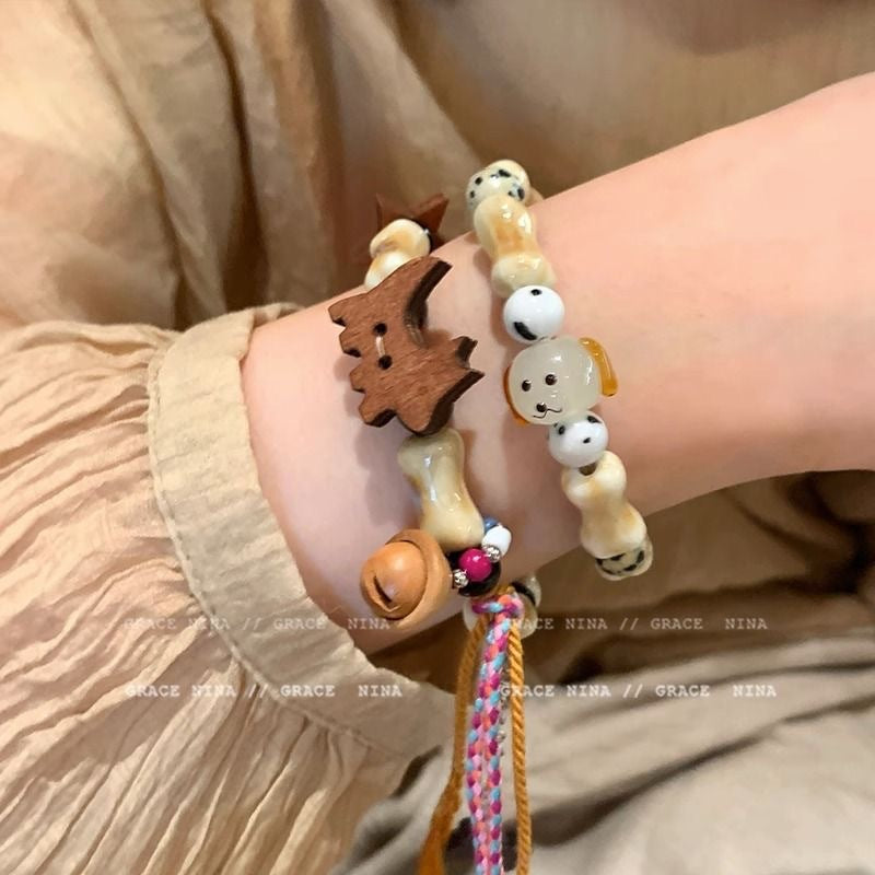 Damen Armband mit bunten Tiermotiven und charmanten Anhängern Shop Nory