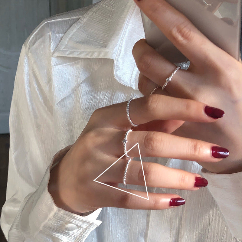 Damen schicker minimalistischer Ring mit zarten Perlenakzenten Shop Nory