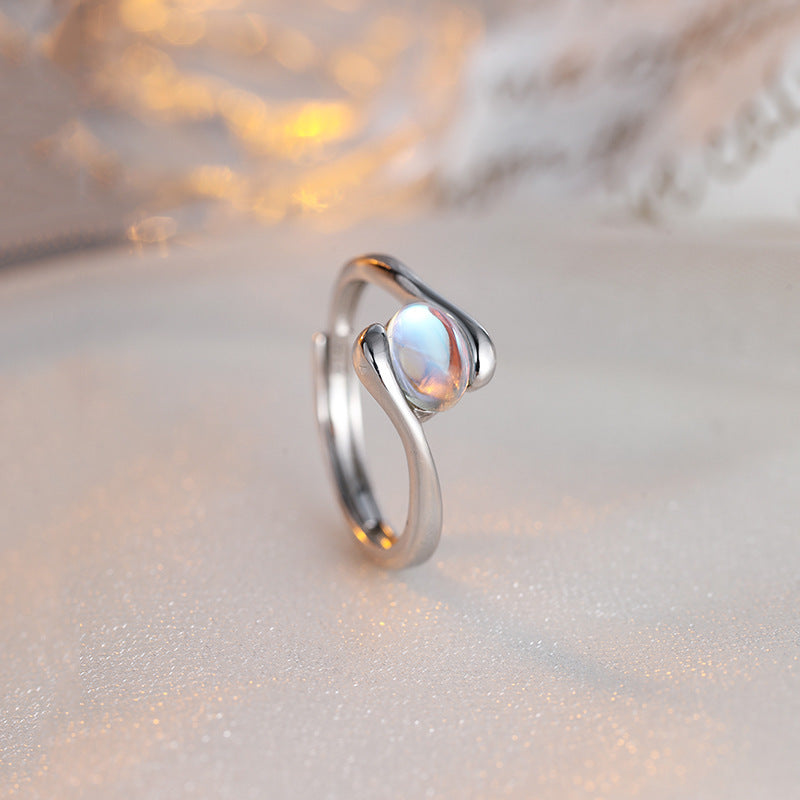 Damen Ring mit elegantem, geschwungenem Design und funkelndem Glasstein Shop Nory