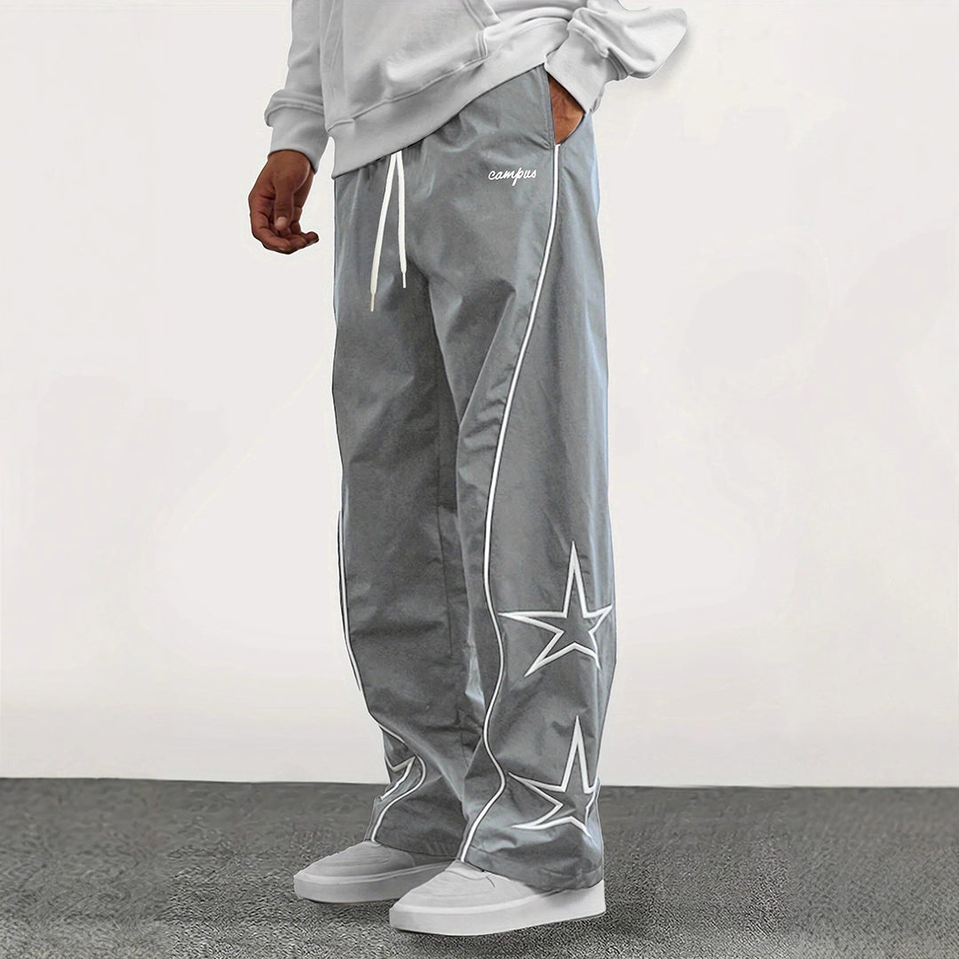 Herren Weite Trackpants mit Kontrastpaspel, Kordelzug und Sternapplikation Shop Nory