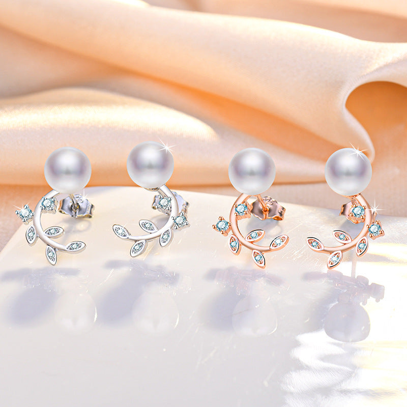 Damen Ohrringe mit filigranem Blatt-Design und edlen Perlen Shop Nory