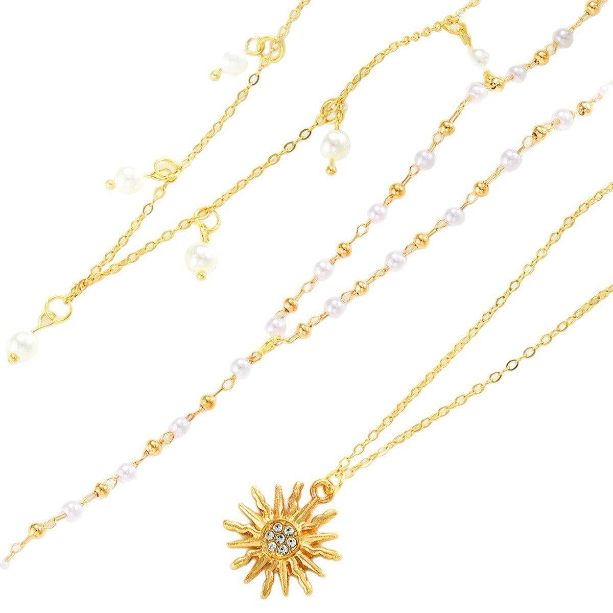 Damen Multilayer-Halskette mit strahlendem Sonnenanhänger und Perlenakzenten Shop Nory