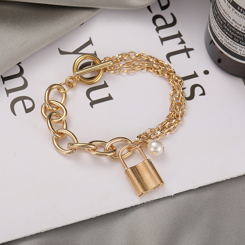 Damen Fußkettchen mit elegantem Schloss- und Perlenanhänger Shop Nory