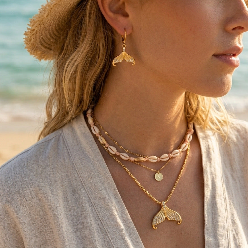 Damen Ohrhänger im eleganten Design mit muschelförmigem Anhänger und Zirkonia Besatz Shop Nory