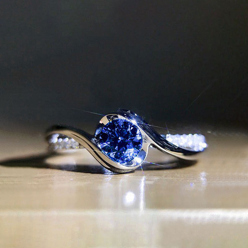 Damenring mit elegantem Twist-Design und funkelndem Zirkonia Shop Nory