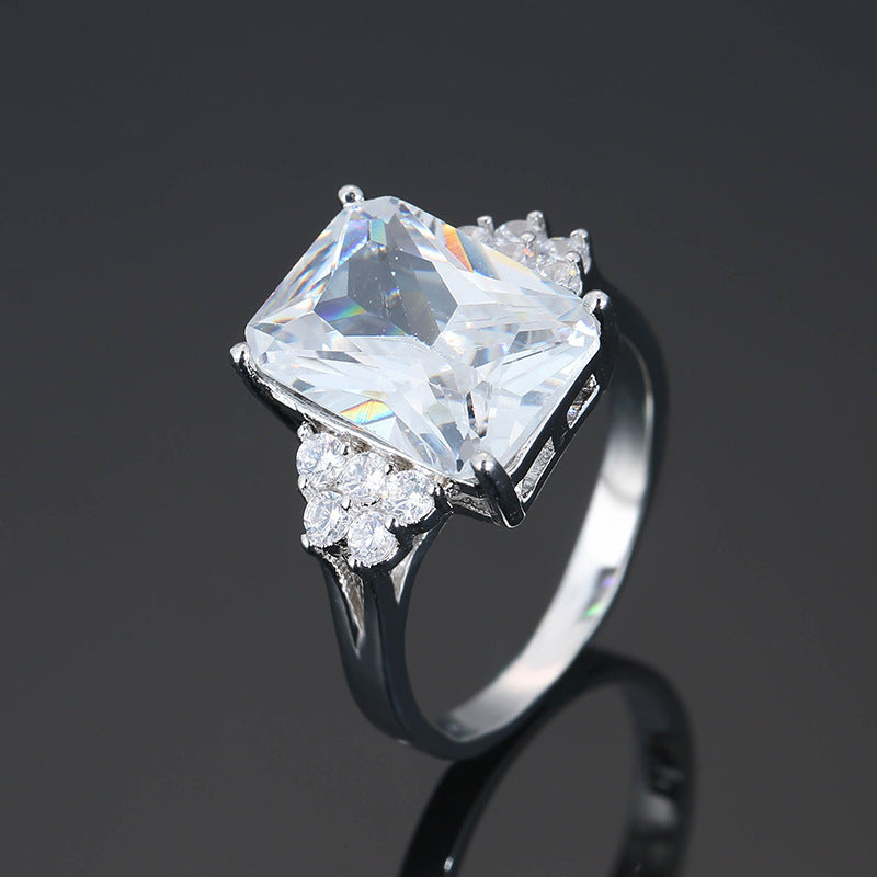 Damen luxuriöser Schmuckring mit rechteckigem pinkem Stein und funkelnden Zirkonia Shop Nory