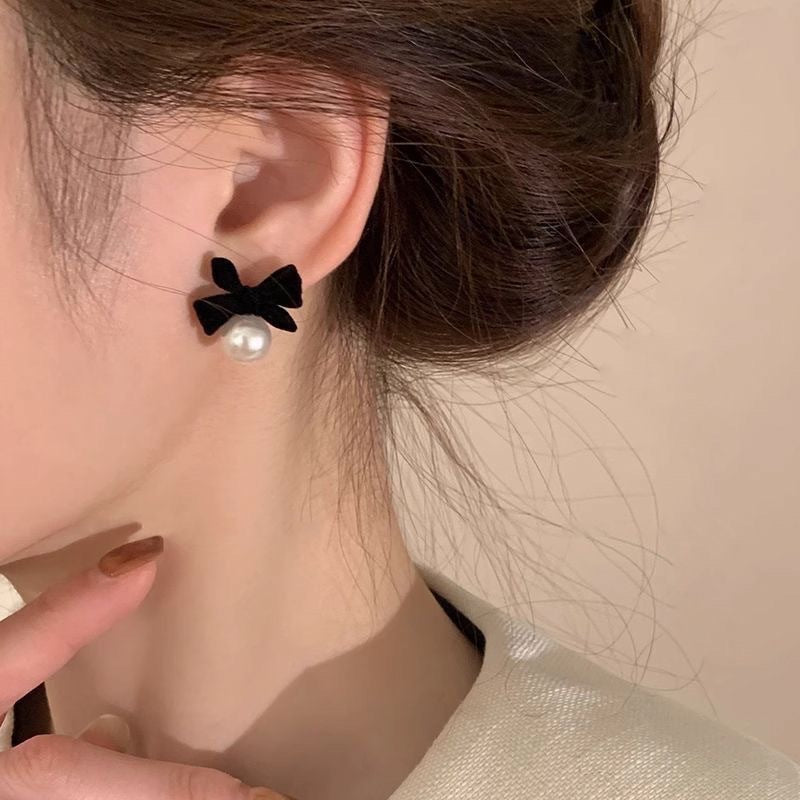 Damen Ohrstecker mit eleganten Schleifen und Perlenakzenten Shop Nory