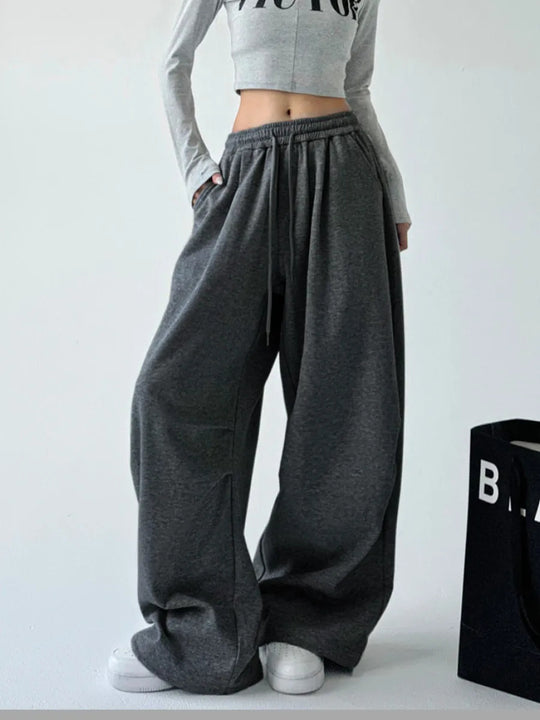Damen weit geschnittene High-Waist Loungehose mit elastischem Bund, Tunnelzug und seitlichen Eingrifftaschen Shop Nory