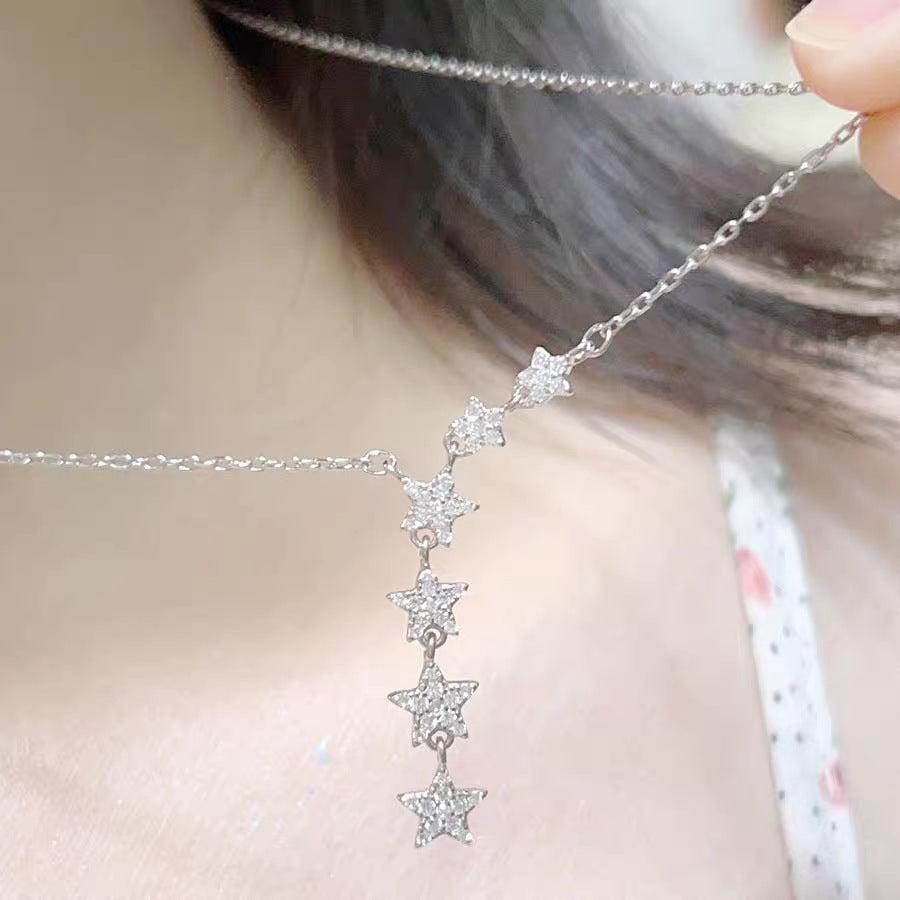 Damen Halskette mit funkelnden Sternen und elegantem Anhänger Shop Nory