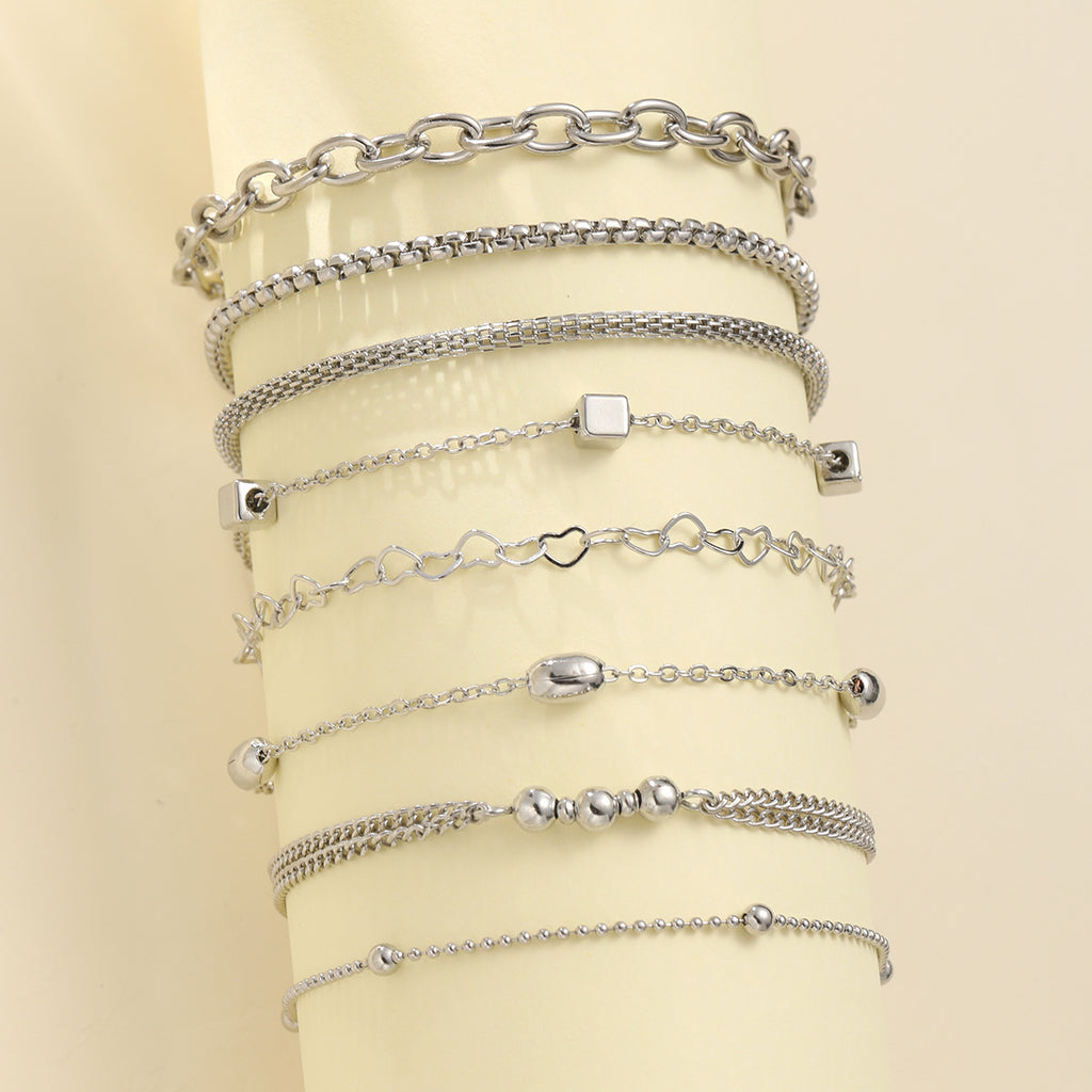 Damen Armband-Set mit feinen, geschmackvollen Ketten und eleganten Anhängern Shop Nory