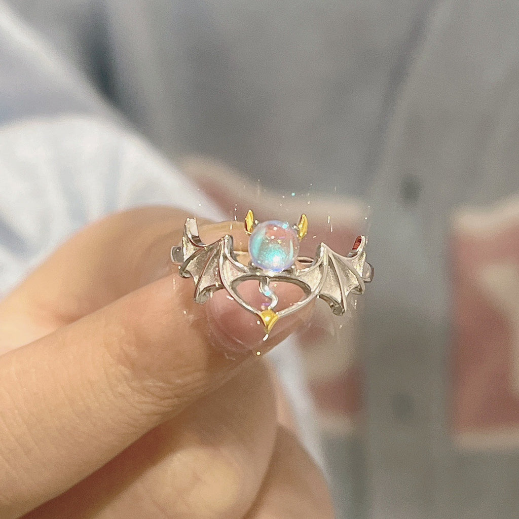 Damen kunstvoller Ring mit funkelndem Opal und eleganten Details Shop Nory