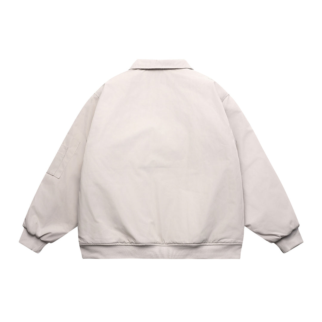 Unisex Kurz geschnittene Boxy‑Bomberjacke mit gesteppter Kontrastfutter-Innenseite, Utility‑Pattentaschen und geripptem Saum Shop Nory