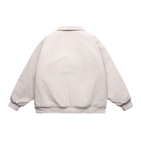 Unisex Kurz geschnittene Boxy‑Bomberjacke mit gesteppter Kontrastfutter-Innenseite, Utility‑Pattentaschen und geripptem Saum Shop Nory