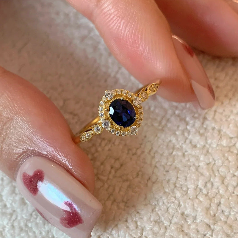 Damenring mit strahlendem blauen Edelstein und funkelnden Zirkonia Shop Nory
