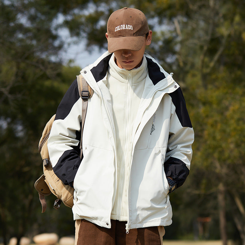 Damen zweilagige wasserabweisende Outdoorjacke mit Kapuze, Taillenregulierung und Kontrastbesätzen Shop Nory