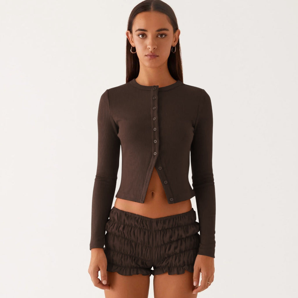 Einfarbige schmal geschnittene lange Strickjacke