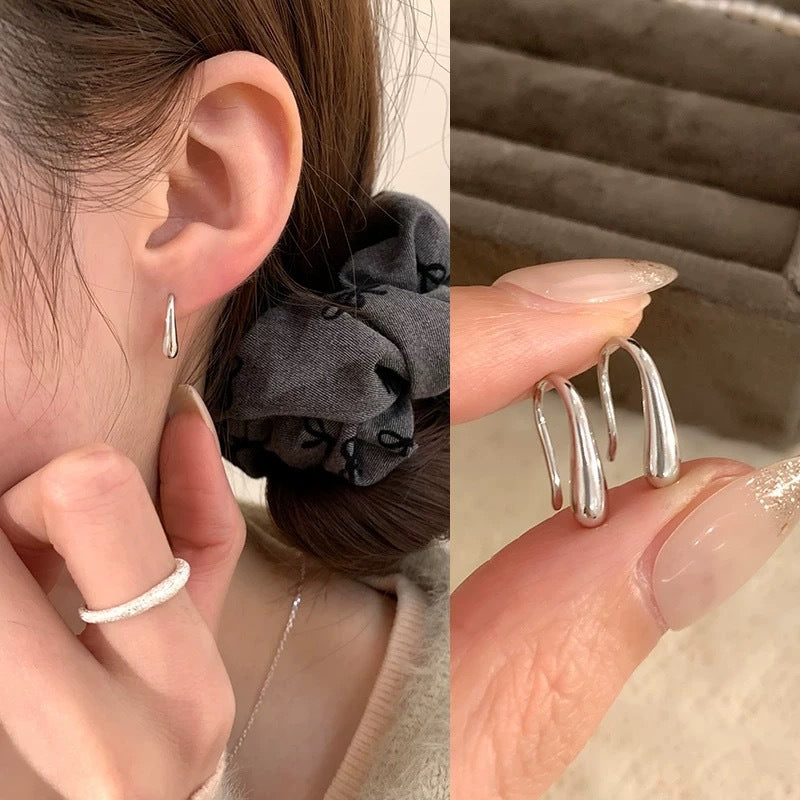 Damen Ohrhänger mit skulpturalem Design und filigraner Verarbeitung Shop Nory