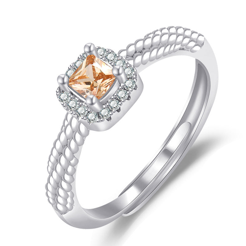 Damenring mit kunstvollem Zirkonia-Besatz und elegantem Golddesign Shop Nory