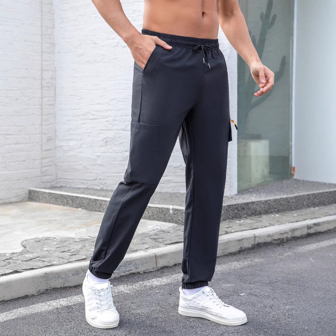 Herren Tech-Cargo-Jogginghose mit elastischem Tunnelzug, Reißverschluss‑Beintasche & eng anliegendem Fußbündchen Shop Nory