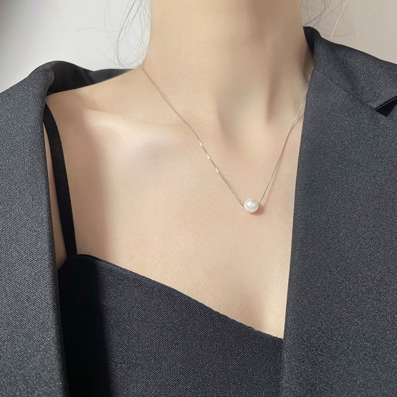 Damen Halskette mit luxuriösem Perlenanhänger und feiner Kettenstruktur Shop Nory