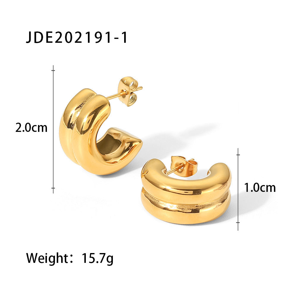 Damen Creolen mit elegantem Wellen-Design aus hochwertigem Edelstahl Shop Nory
