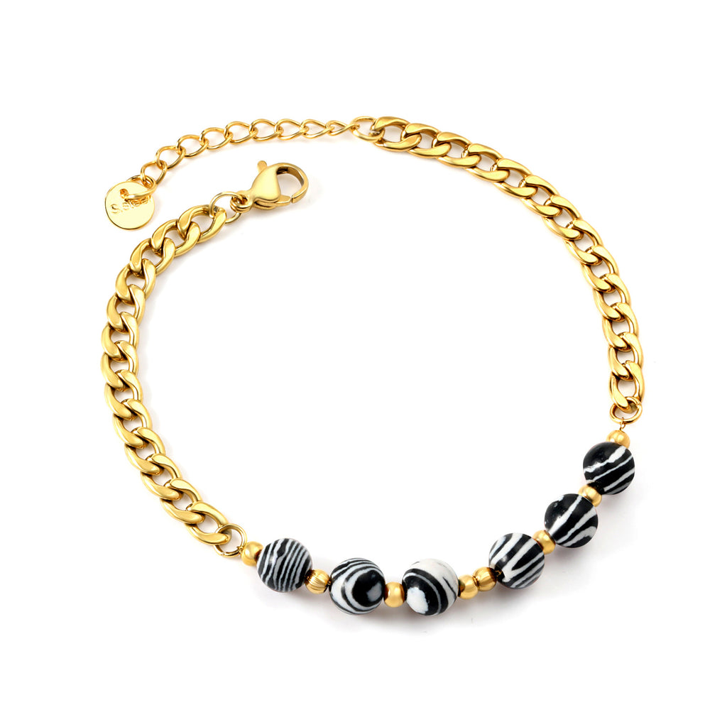Damen Armband mit glänzender Gliederkette und elegantem Zebra-Muster Shop Nory
