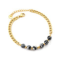 Damen Armband mit glänzender Gliederkette und elegantem Zebra-Muster Shop Nory