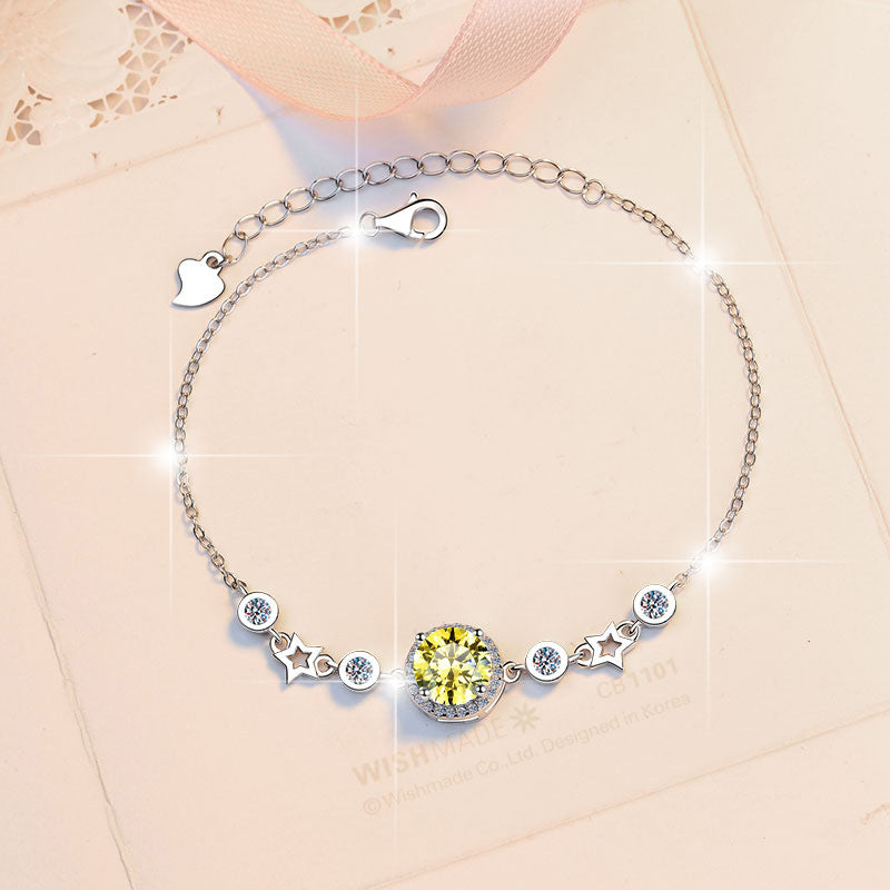 Damenarmband mit strahlendem Kristall und funkelnden Sternen Shop Nory