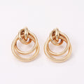 Damen Hängende Ohrringe mit elegantem, geschwungenem Ringdesign Shop Nory