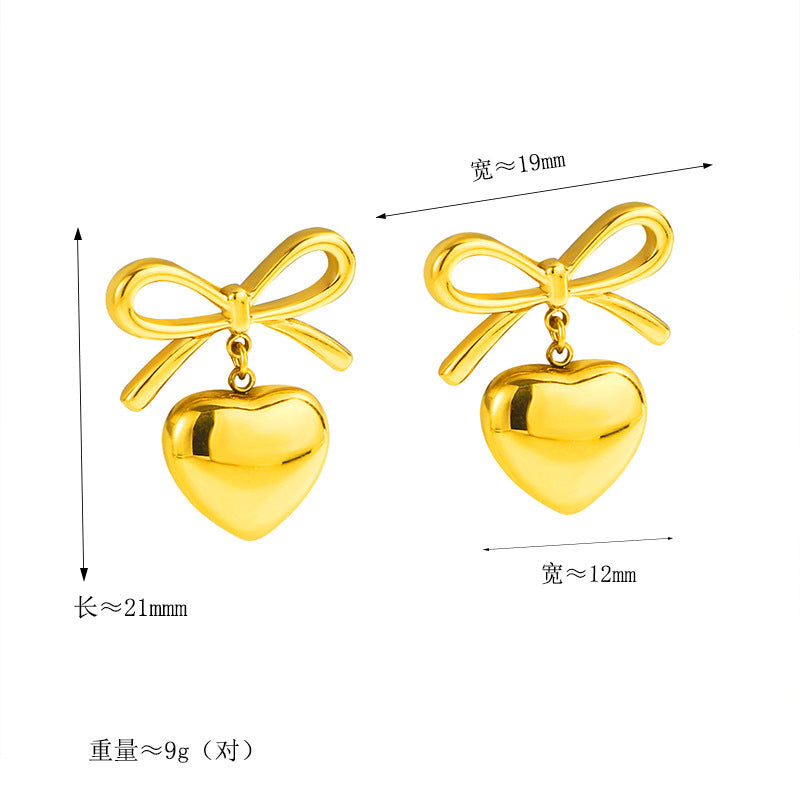 Damen elegante Ohrringe mit herzförmigem Anhänger und Schleifendesign Shop Nory